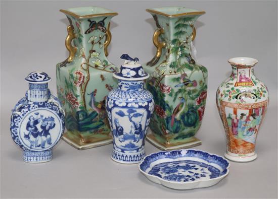 A pair of Chinese famille rose celadon ground vases, two blue and white vases and a spoon tray, all Qing dynasty